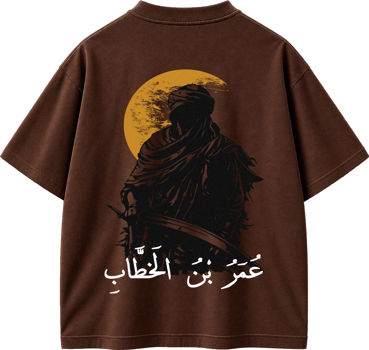 A brown short-sleeve t-shirt shown from the back, featuring a graphic print of a hooded figure holding a sword in front of a large yellow moon, with white Arabic text below.