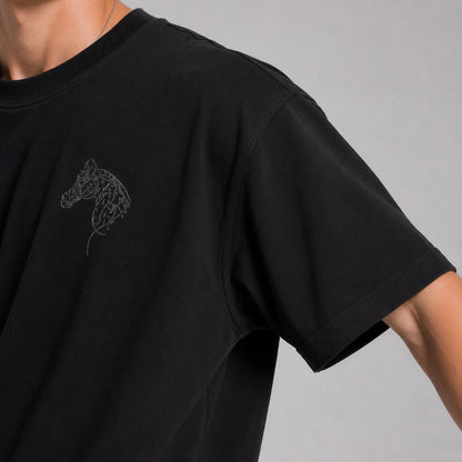 Black t-shirt with a horse logo on a gray background
