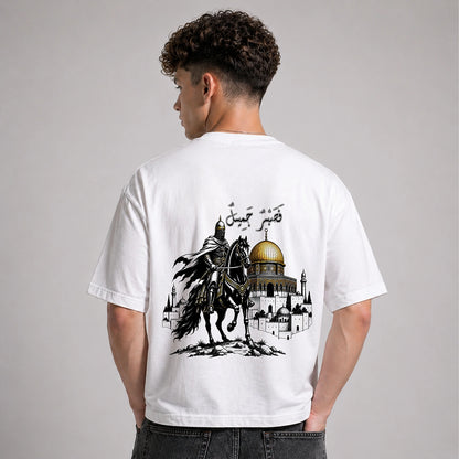 Person wearing a white t-shirt with a graphic design on the back, featuring a horse and architectural elements.