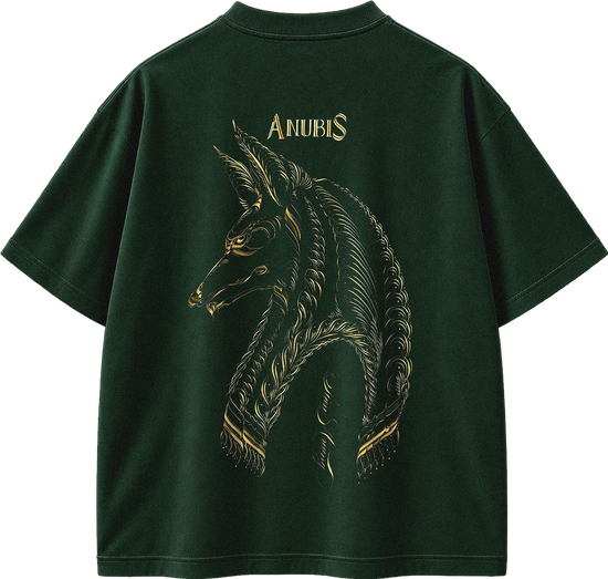 A dark forest green short-sleeve t-shirt shown from the back, featuring a large gold graphic of an Anubis horse head and the word 'ANUBIS' printed in gold above it.