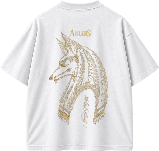 White short-sleeve T-shirt shown from the back, featuring a large gold Anubis graphic and the word 'ANUBIS' printed in gold above the illustration.