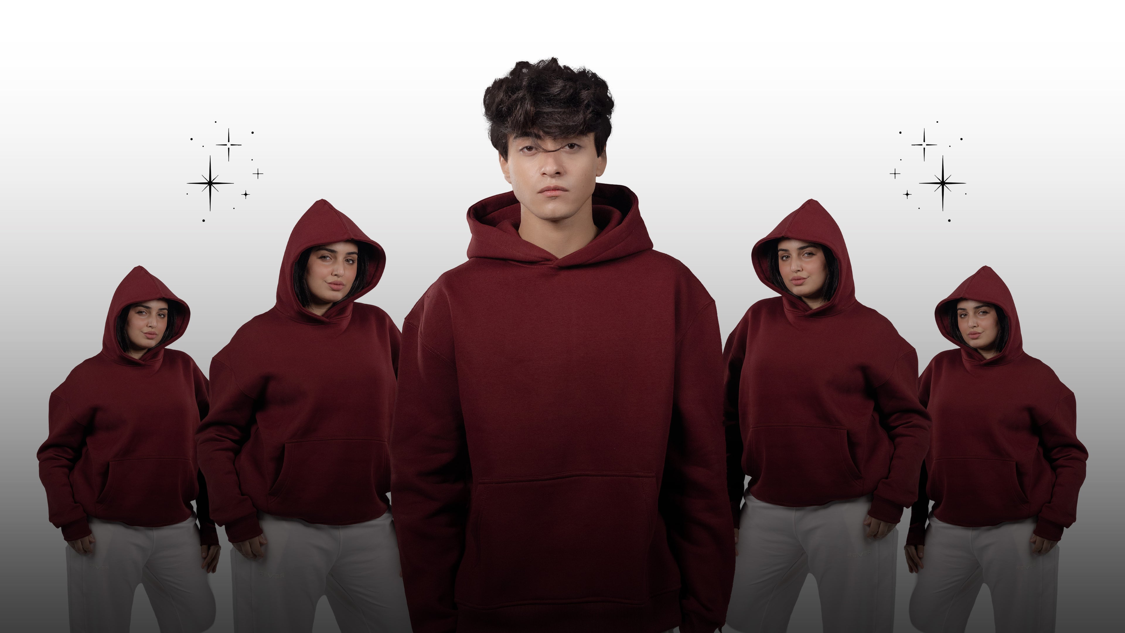 Person wearing a maroon hoodie with five identical images of themselves in the background on a light gray background.