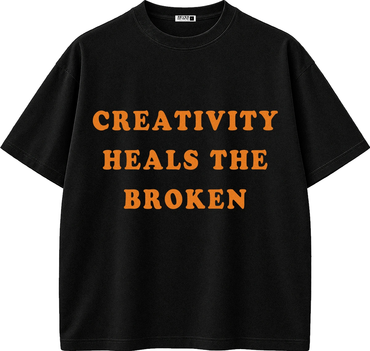 A black short-sleeve crewneck t-shirt with the phrase 'CREATIVITY HEALS THE BROKEN' printed in bold orange capital letters across the chest.