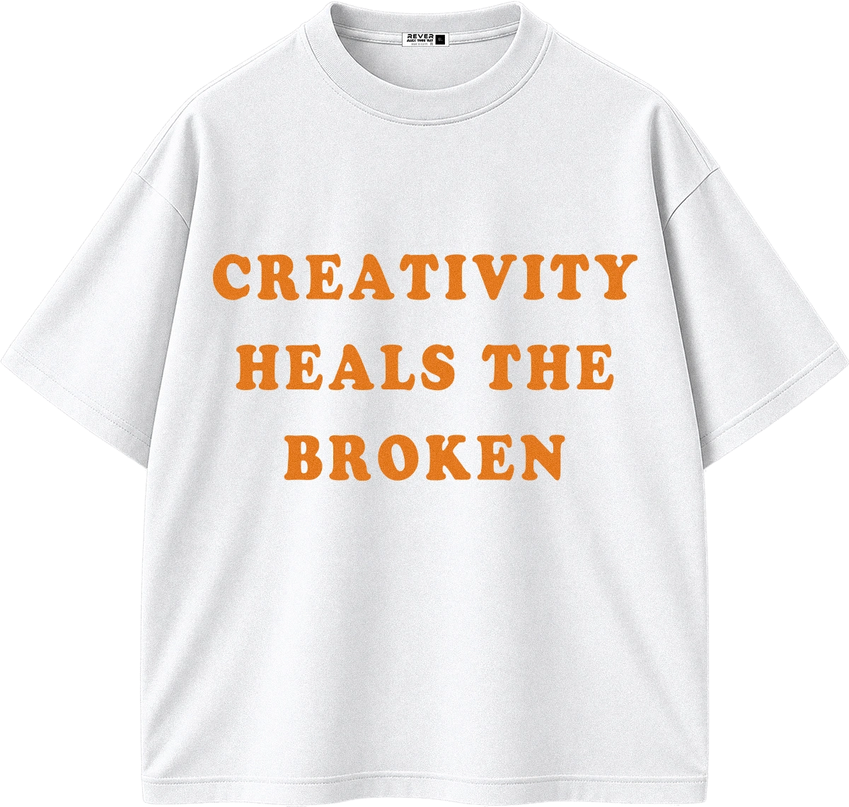 A white short-sleeve crewneck t-shirt with the phrase 'CREATIVITY HEALS THE BROKEN' printed in orange across the chest.