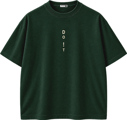 A dark forest green short-sleeve t-shirt with the word 'DO IT' printed vertically in light beige on the center chest, displayed on a clean white background.