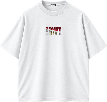 A white short-sleeve crewneck t-shirt with a graphic print on the chest spelling 'EGYPT' in the style of the Egyptian flag, featuring red, white, and green horizontal stripes with a golden eagle silhouette in the center.