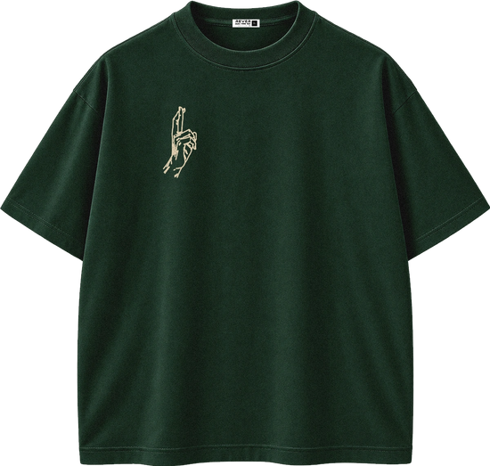 A dark forest green short-sleeve crewneck t-shirt with a small beige graphic of two hands holding a small object on the left chest, displayed on a clean white background.