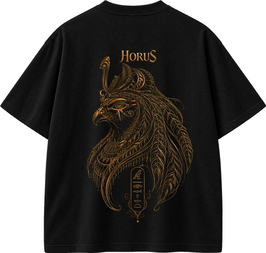 A black short-sleeve T-shirt shown flat against a white background, featuring a large ornate gold graphic of a bird head with feather-like details and the word "HORUS" printed above it.