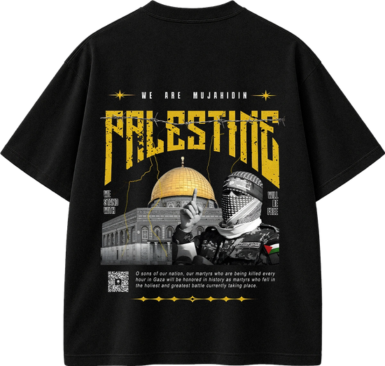 A black short-sleeve graphic T-shirt shown flat against a white background. The back of the shirt features a large distressed yellow 'PALESTINE' print, the text 'WE ARE MUJAHIDIN', a photo of the Dome of the Rock, a masked figure raising a finger, and additional small text and a QR code graphic.