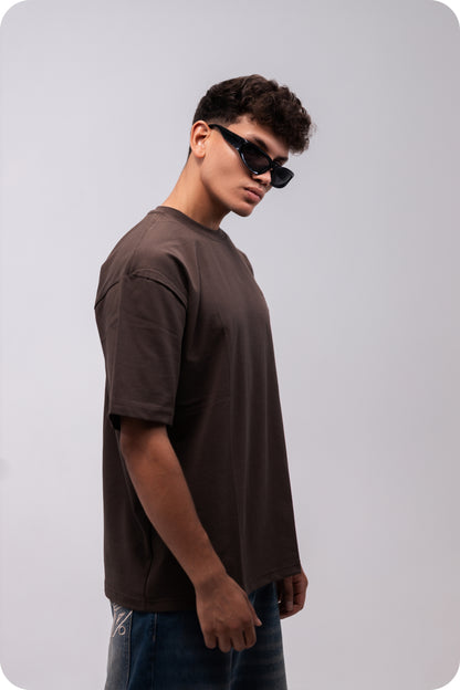 REVER brown plain oversized t-shirt shown from the back with clean, minimal design