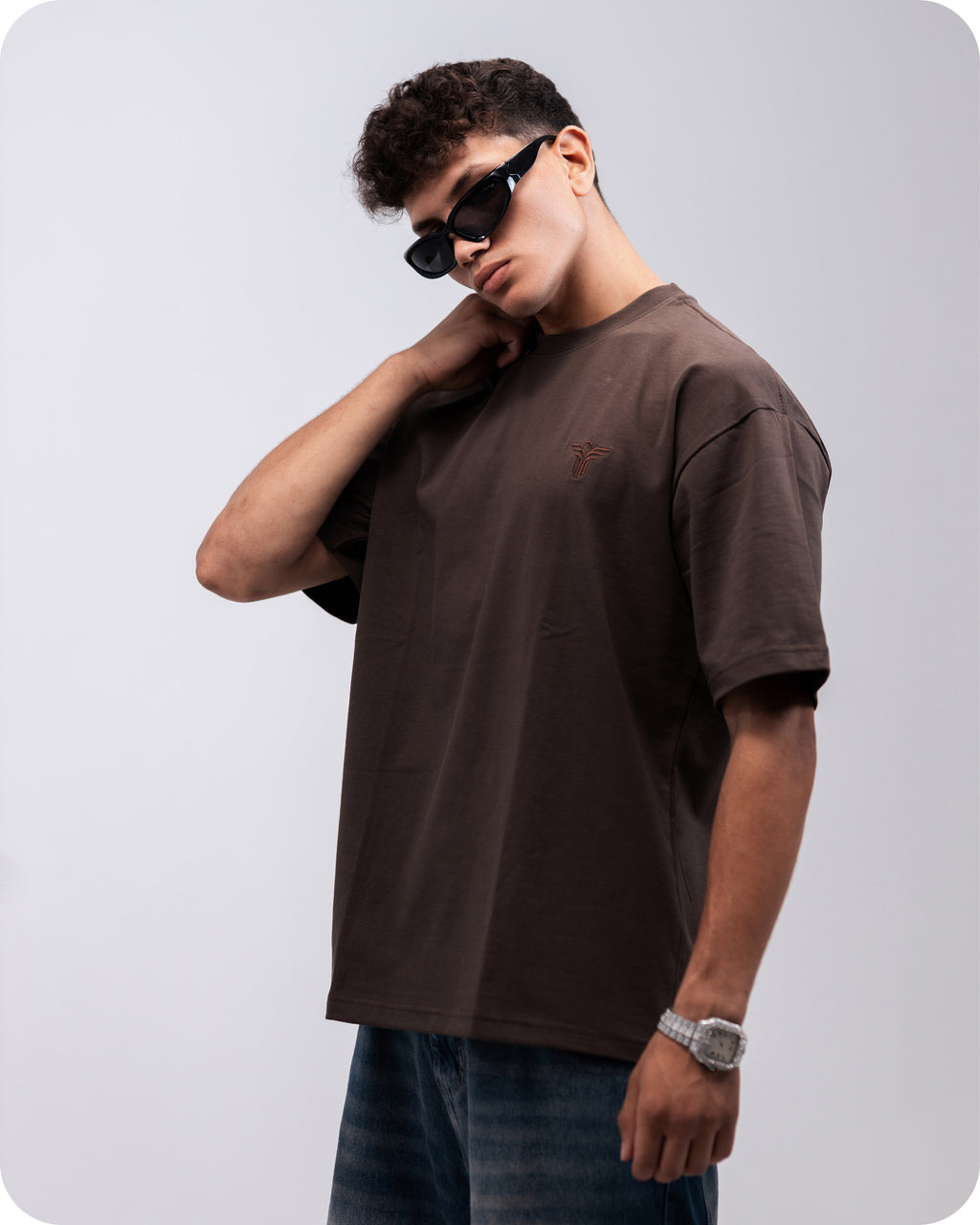 REVER brown plain oversized t-shirt shown from the back with clean, minimal design