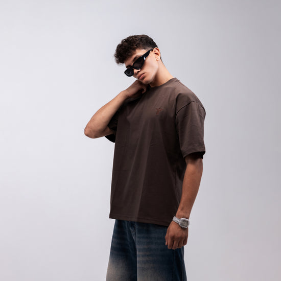 REVER brown plain oversized t-shirt shown from the back with clean, minimal design
