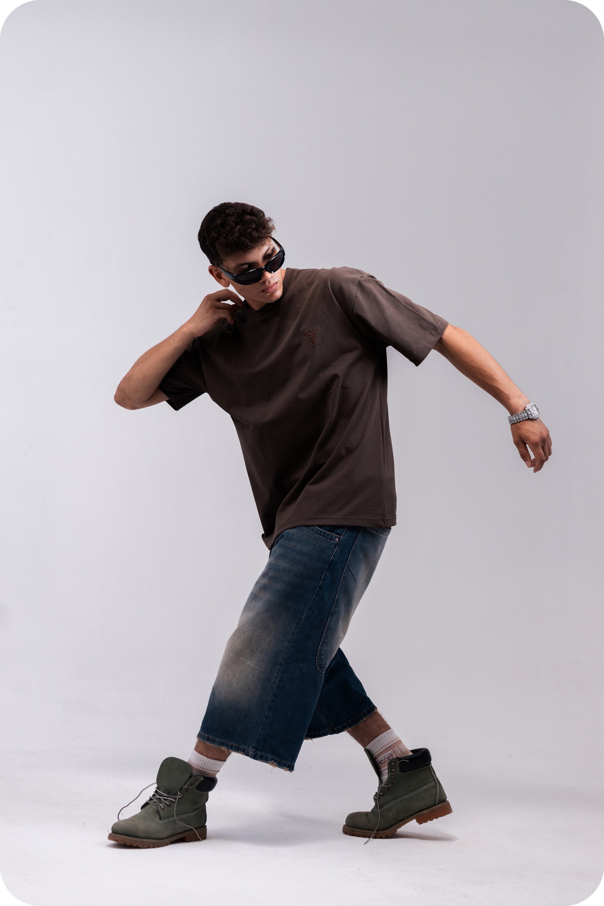 REVER brown plain oversized t-shirt shown from the back with clean, minimal design