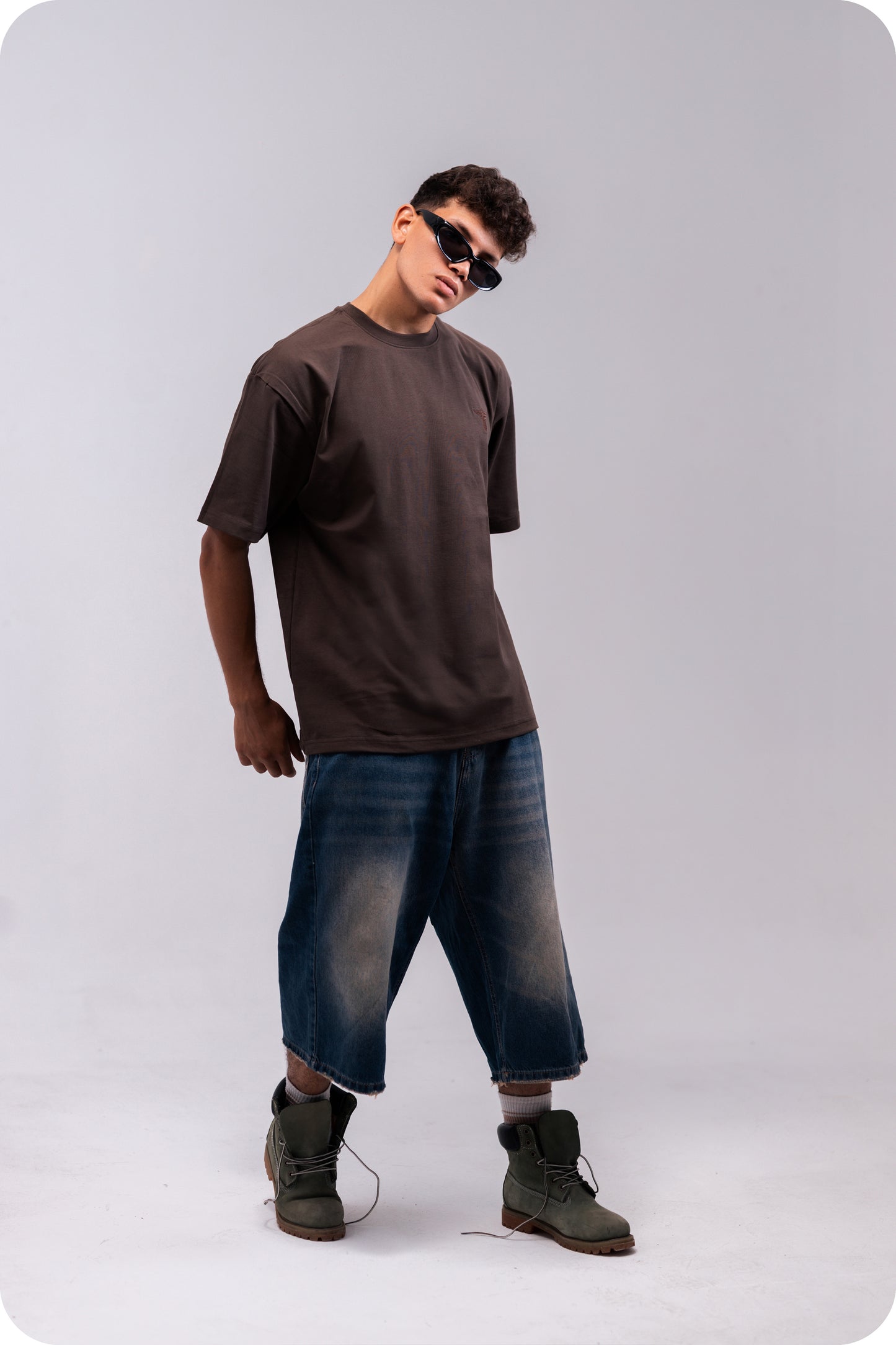 REVER brown plain oversized t-shirt shown from the back with clean, minimal design