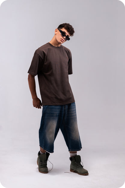 REVER brown plain oversized t-shirt shown from the back with clean, minimal design