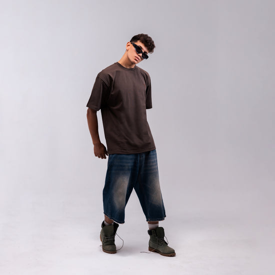 REVER brown plain oversized t-shirt shown from the back with clean, minimal design