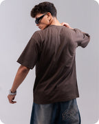 REVER brown plain oversized t-shirt shown from the back with clean, minimal design