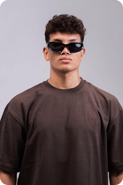 REVER brown plain oversized t-shirt shown from the back with clean, minimal design