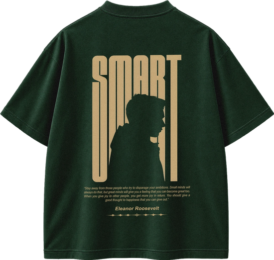 A brown short-sleeve t-shirt shown from the back, featuring a large beige graphic print of the word 'SMART' with a silhouette of a person inside the letters, and a quote attributed to Eleanor Roosevelt below.