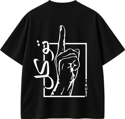 A black short-sleeve t-shirt with a white graphic print on the back. The graphic features a hand making a middle-finger gesture inside a square outline, stylized white calligraphy, and the word 'TRUST' printed vertically.