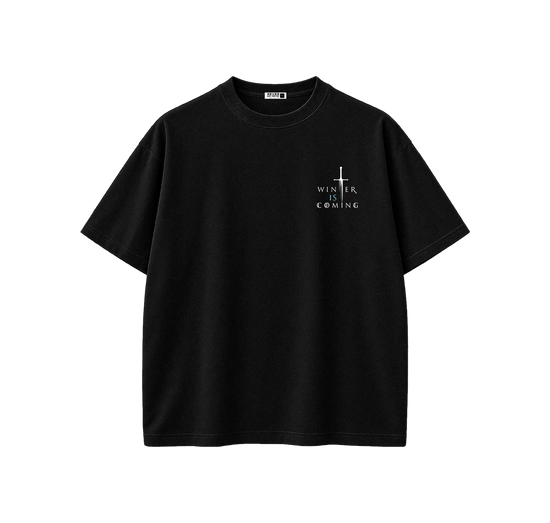 A black short-sleeve crewneck t-shirt with a small white graphic on the left chest featuring a cross and the text 'WINTER IS COMING'.