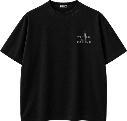 A black short-sleeve crewneck t-shirt with a small white graphic on the left chest featuring a cross and the text 'WINTER IS COMING'.