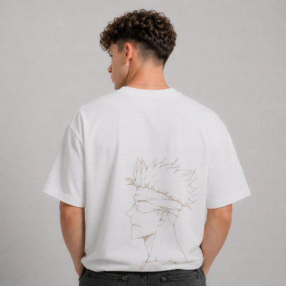 Person wearing a white t-shirt with a graphic design on the back against a gray background