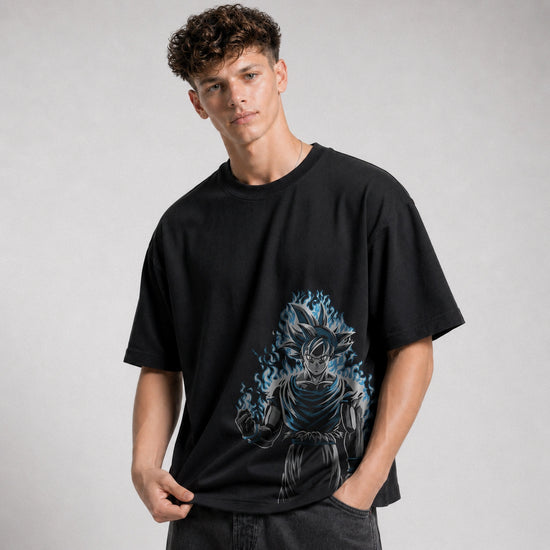 Person wearing a black t-shirt with a graphic design on a gray background