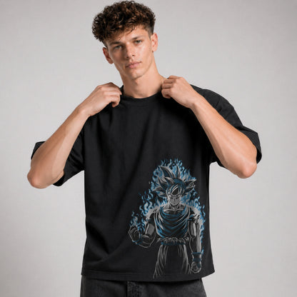 Person wearing a black t-shirt with a graphic design on a plain background