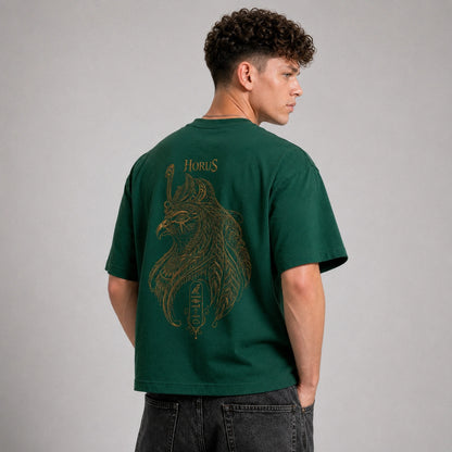 Person wearing a green t-shirt with a lion graphic and 'Horus' text on the back, against a gray background.