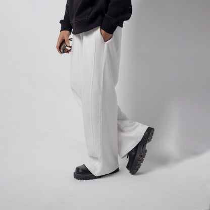 REVER – Baggy Pants – Off White PLAIN Baggy Pants – Premium soft fabric, relaxed fit for ultimate comfort and effortless street style.
