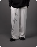 REVER – Baggy Pants – Off White PRINTED Baggy Pants – Premium soft fabric, relaxed fit for ultimate comfort and effortless street style.