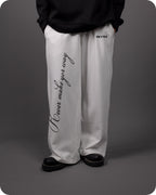 REVER – Baggy Pants – Off White PRINTED Baggy Pants – Premium soft fabric, relaxed fit for ultimate comfort and effortless street style.