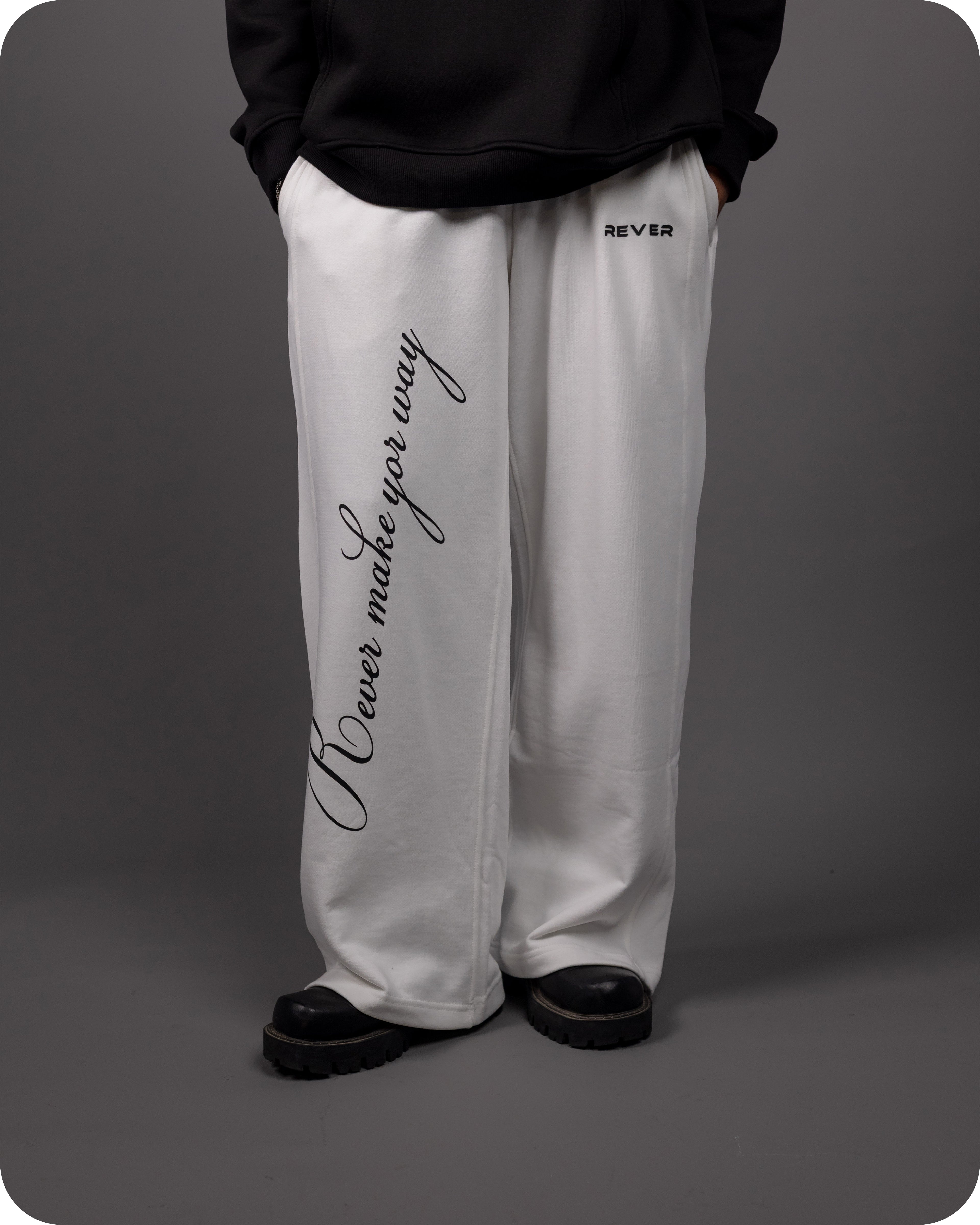REVER – Baggy Pants – Off White PRINTED Baggy Pants – Premium soft fabric, relaxed fit for ultimate comfort and effortless street style.