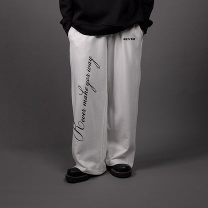 REVER – Baggy Pants – Off White PRINTED Baggy Pants – Premium soft fabric, relaxed fit for ultimate comfort and effortless street style.