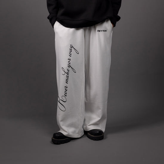 REVER – Baggy Pants – Off White PRINTED Baggy Pants – Premium soft fabric, relaxed fit for ultimate comfort and effortless street style.
