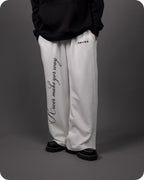REVER – Baggy Pants – Off White PRINTED Baggy Pants – Premium soft fabric, relaxed fit for ultimate comfort and effortless street style.