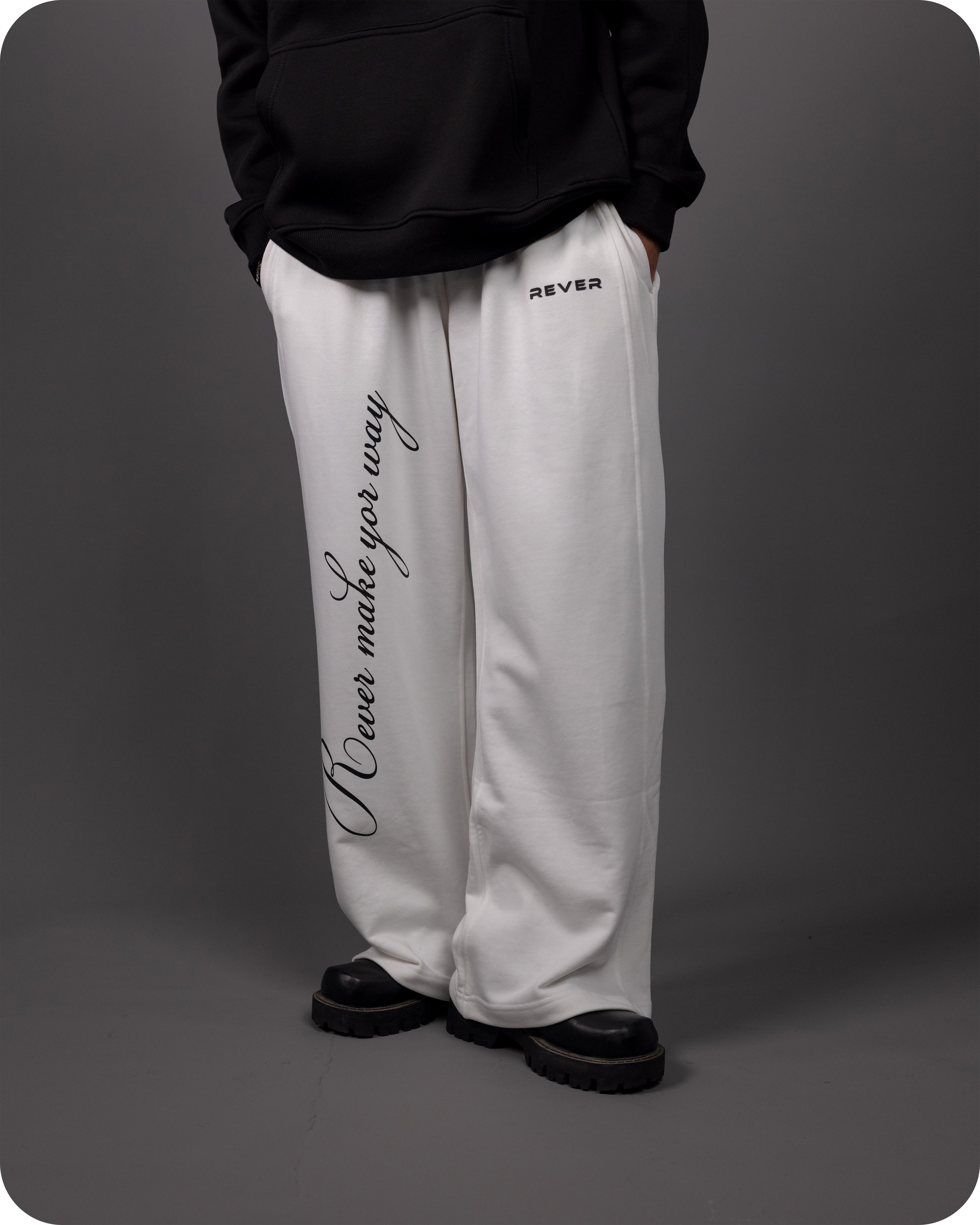 REVER – Baggy Pants – Off White PRINTED Baggy Pants – Premium soft fabric, relaxed fit for ultimate comfort and effortless street style.