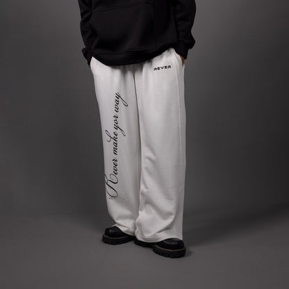REVER – Baggy Pants – Off White PRINTED Baggy Pants – Premium soft fabric, relaxed fit for ultimate comfort and effortless street style.