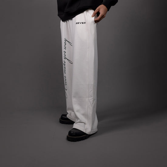 REVER – Baggy Pants – Off White PRINTED Baggy Pants – Premium soft fabric, relaxed fit for ultimate comfort and effortless street style.