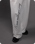 REVER – Baggy Pants – Off White PRINTED Baggy Pants – Premium soft fabric, relaxed fit for ultimate comfort and effortless street style.