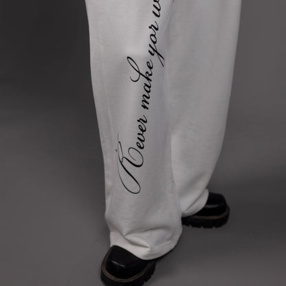 REVER – Baggy Pants – Off White PRINTED Baggy Pants – Premium soft fabric, relaxed fit for ultimate comfort and effortless street style.