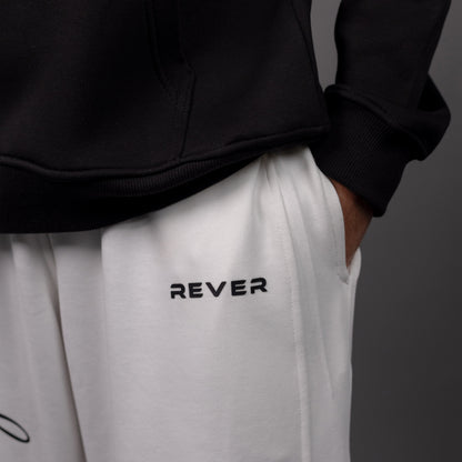 REVER – Baggy Pants – Off White PRINTED Baggy Pants – Premium soft fabric, relaxed fit for ultimate comfort and effortless street style.