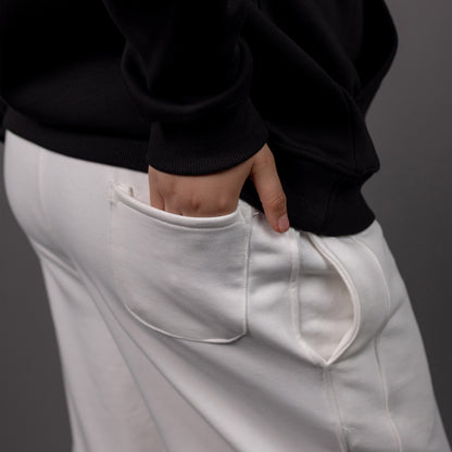 REVER – Baggy Pants – Off White PRINTED Baggy Pants – Premium soft fabric, relaxed fit for ultimate comfort and effortless street style.