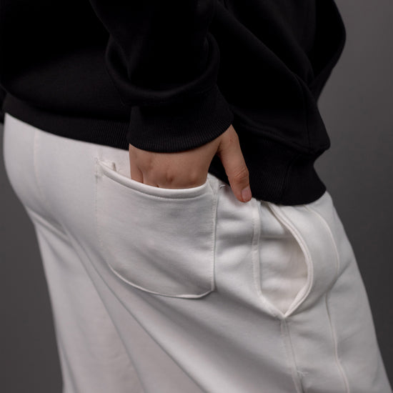 REVER – Baggy Pants – Off White PRINTED Baggy Pants – Premium soft fabric, relaxed fit for ultimate comfort and effortless street style.