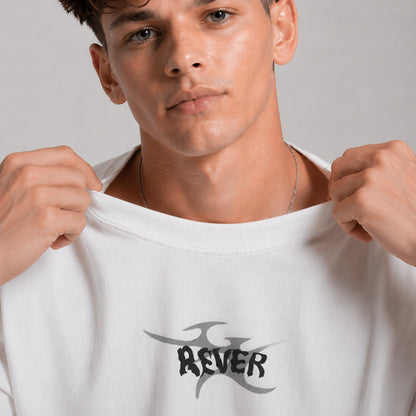 Man holding a white t-shirt with 'REVER' logo against a plain background