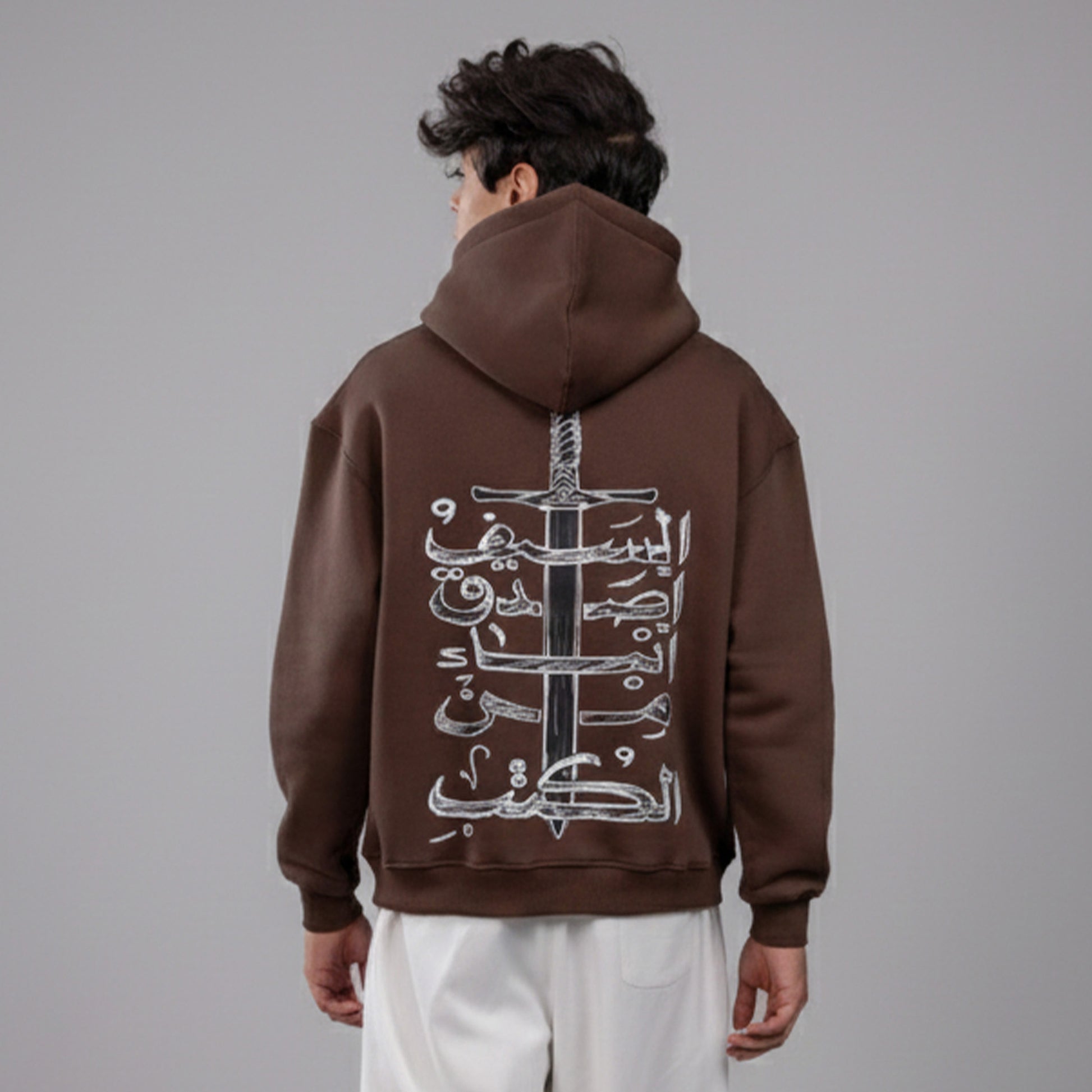REVER – Oversized Hoodie – Brown THE SWORD Print – Premium soft fabric, relaxed fit for ultimate comfort and effortless street style.