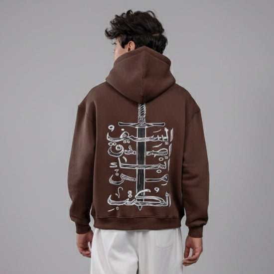 REVER – Oversized Hoodie – Brown THE SWORD Print – Premium soft fabric, relaxed fit for ultimate comfort and effortless street style.